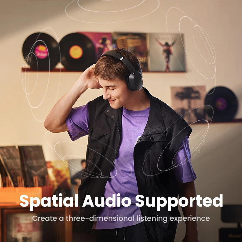 Person wearing UGREEN headphones with spatial audio