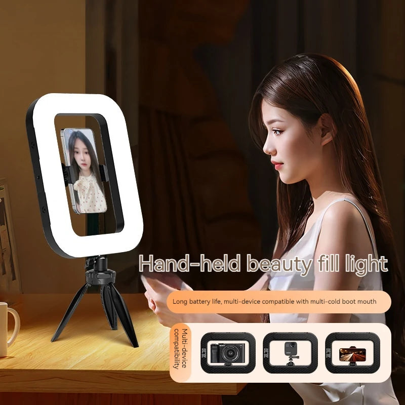 Handheld beauty fill light illuminating a phone video