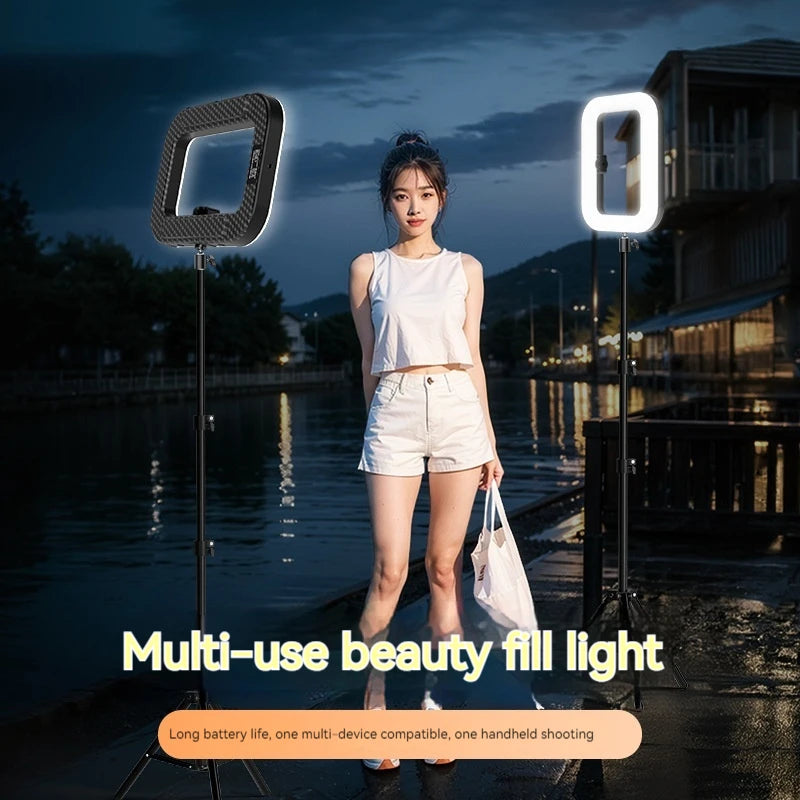 Handheld ring light used for an outdoor portrait